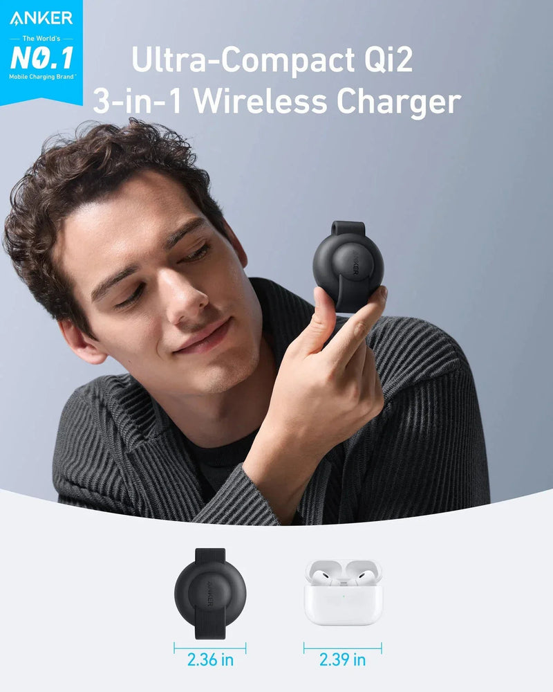 Person holding a black wireless charger with Anker branding and product details.